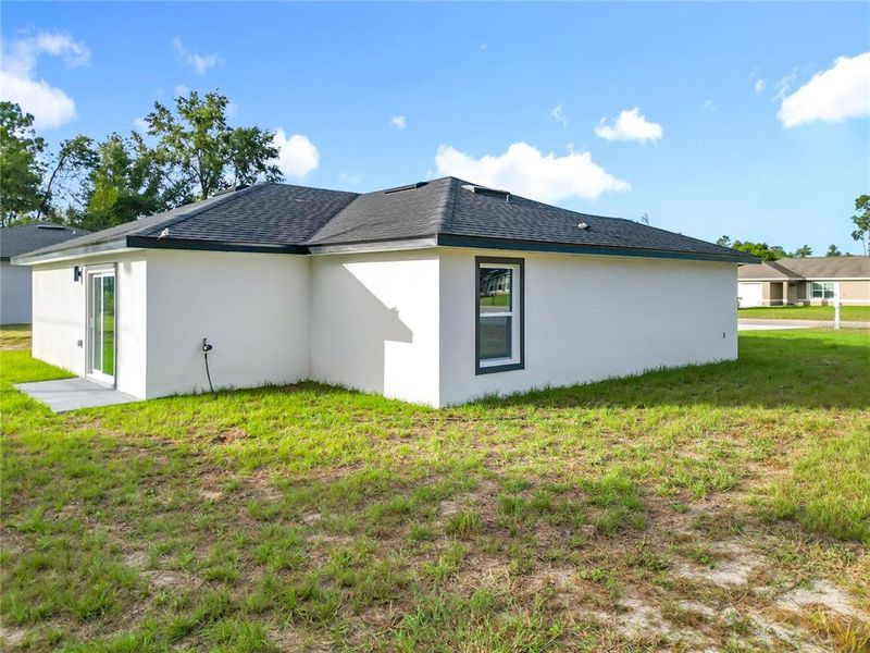 Exterior details and patio area of a home in , Ocala (Image 19).