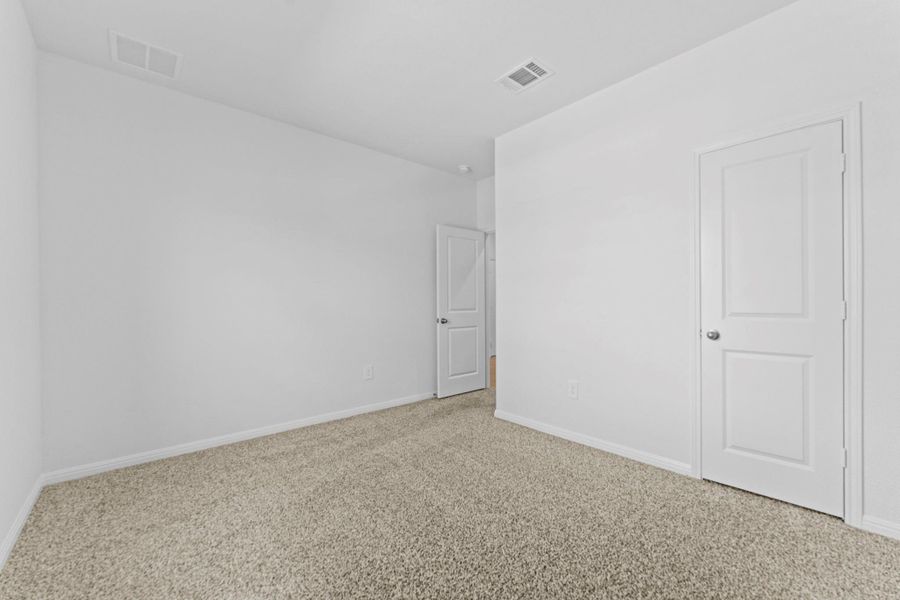 Spacious, unfurnished interior of a new home in Bar W Ranch, Leander (Image 28).
