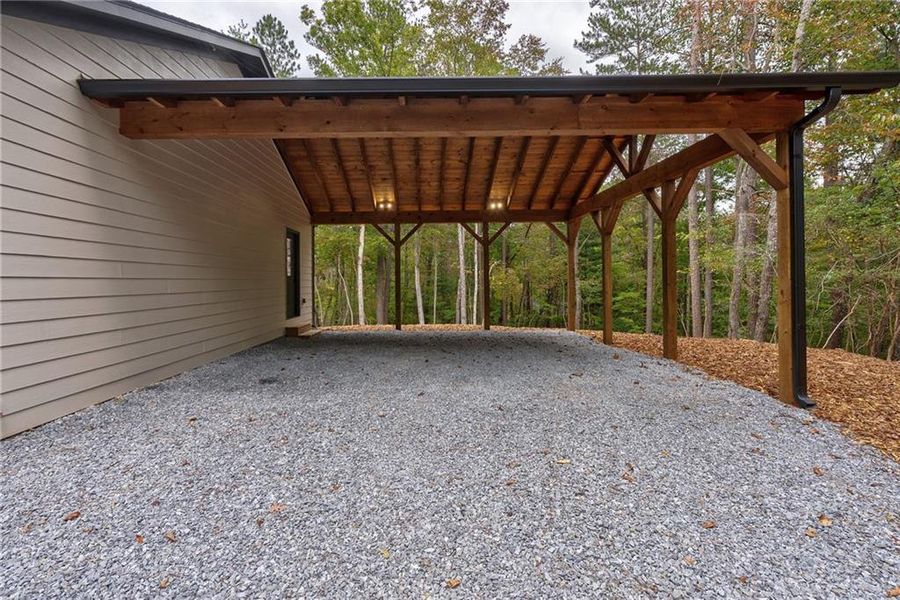 Exterior details and patio area of a home in , Ellijay (Image 27).