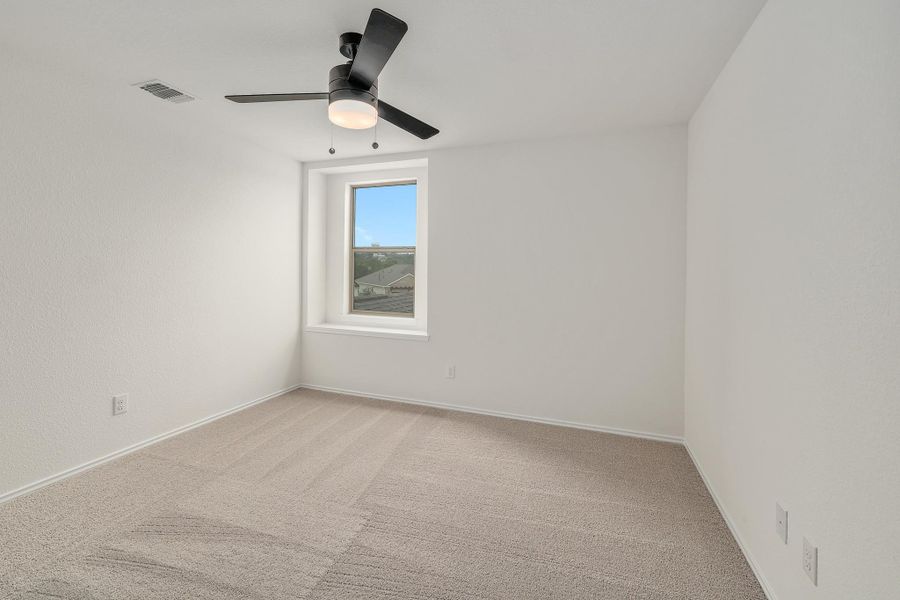 Spacious, unfurnished interior of a new home in River Bluff, Leander (Image 17).