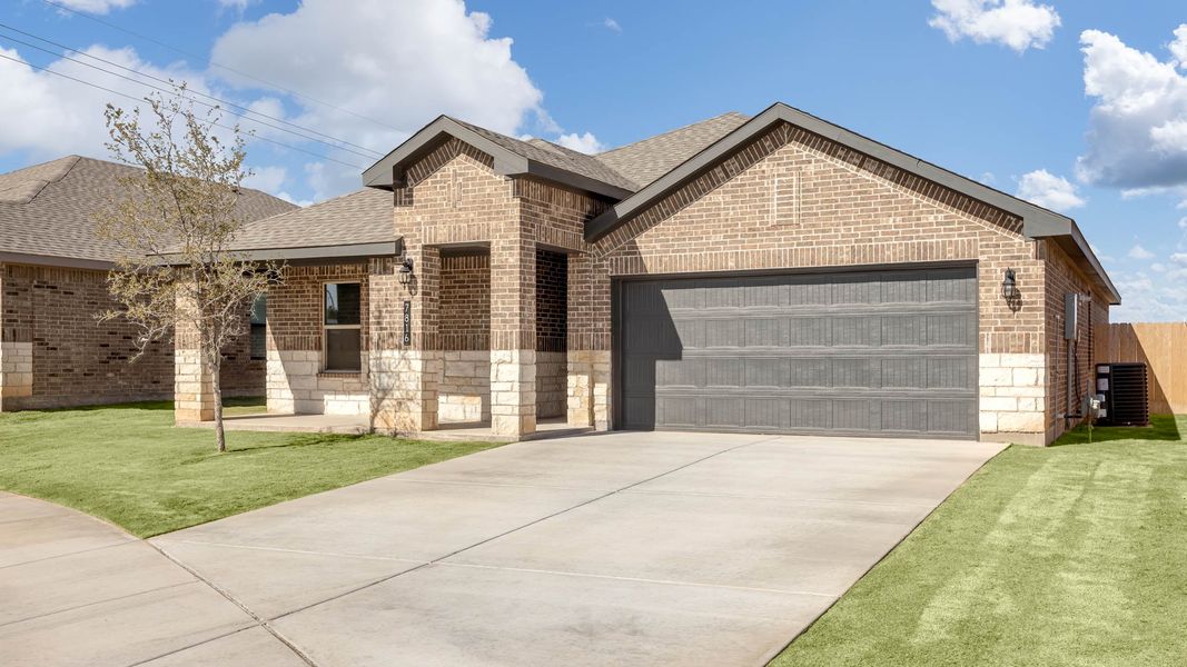 Front exterior of a new home in Everest Heights, Lubbock, TX, highlighting curb appeal (Image 2). Front exterior of a new home in Everest Heights, Lubbock, TX, highlighting curb appeal (Image 2).