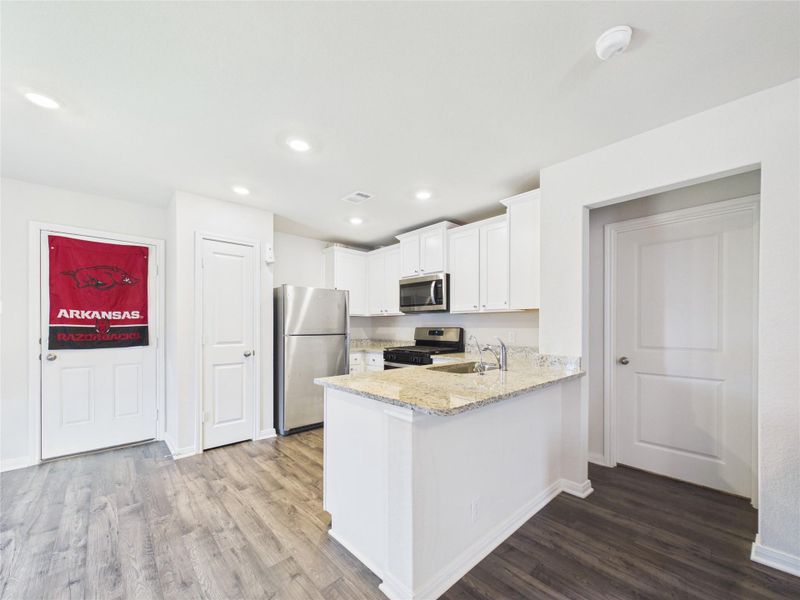 Furnished interior view inside a new home in Park Vista at El Tesoro, Houston (Image 8).