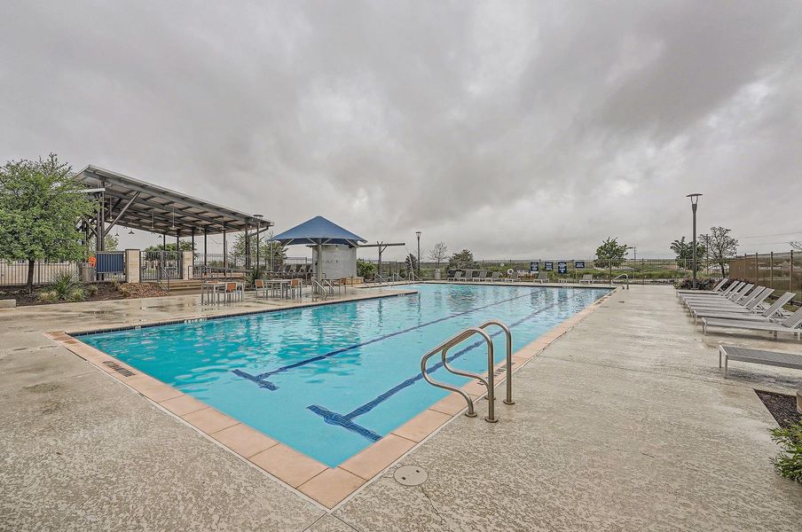 Pool with a patio area, a gazebo, and fence
