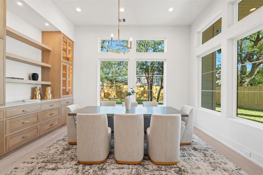 Stunning formal dining room with fabulous views of the backyard. Previous TOMO Homes project.