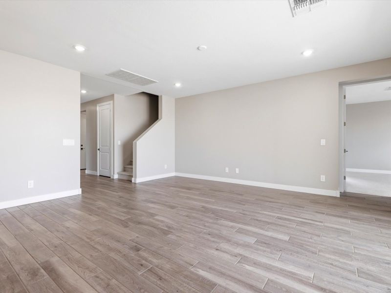Spacious, unfurnished interior of a new home in Blossom Rock Signature Series, Apache Junction (Image 15). Spacious, unfurnished interior of a new home in Blossom Rock Signature Series, Apache Junction (Image 15).