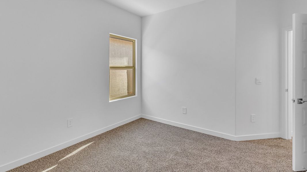 Representative unfurnished interior of a home built from the Parker by D.R. Horton in The Oasis at Rocking K, Vail (Image 33).