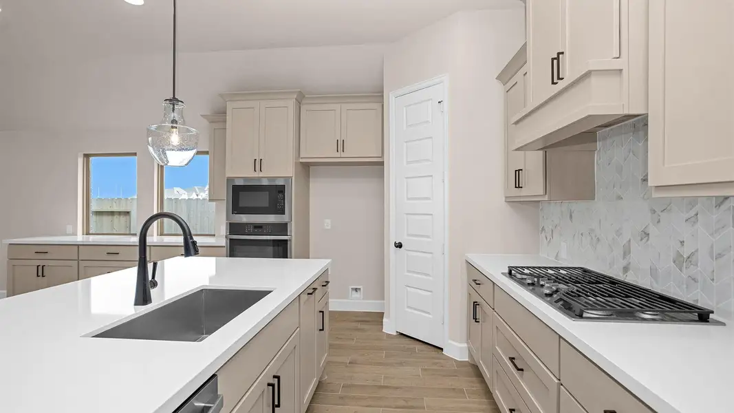 Furnished interior view inside a new home in Grange 50', Katy (Image 4). Furnished interior view inside a new home in Grange 50', Katy (Image 4).