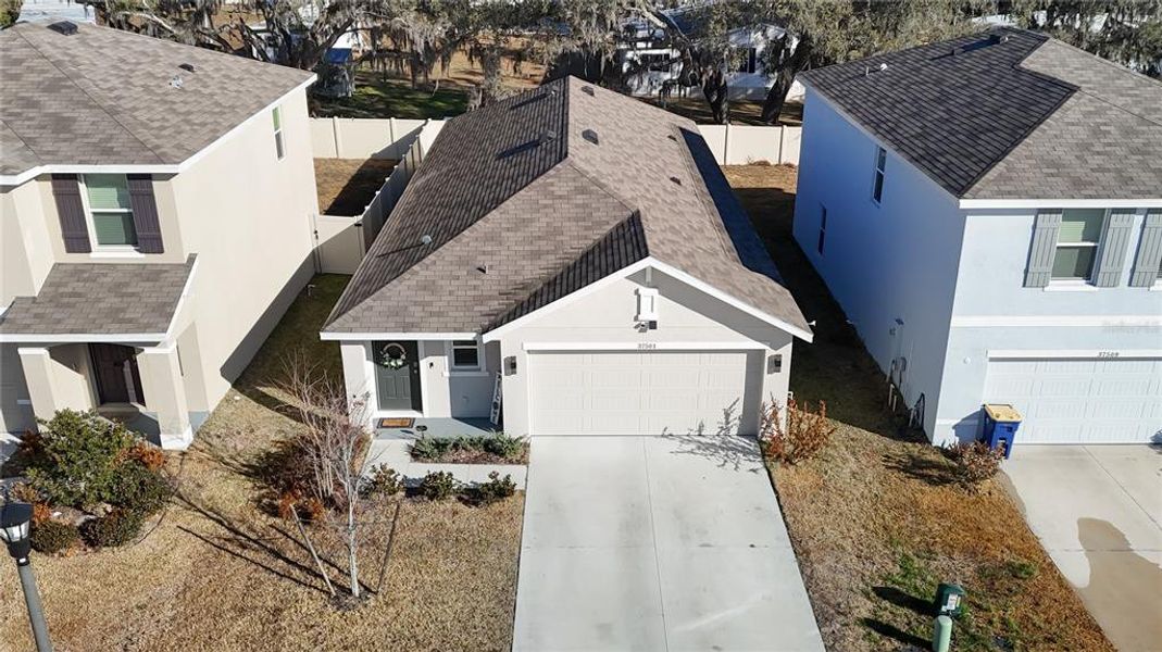 Front exterior of a new home in , Zephyrhills, FL, highlighting curb appeal (Image 23).