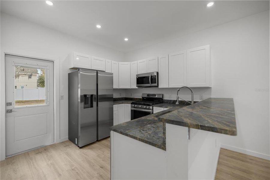 Furnished interior view inside a new home in , Williston (Image 5).