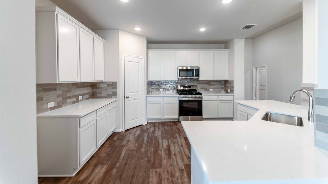 Furnished interior view inside a new home in Sunfield, Buda (Image 3). Furnished interior view inside a new home in Sunfield, Buda (Image 3).