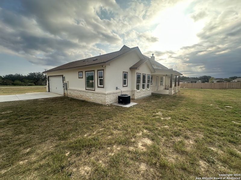 Exterior details and patio area of a home in , Floresville (Image 15).