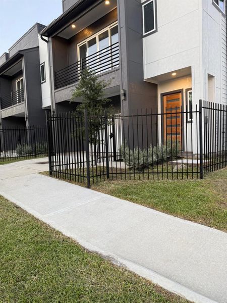 Exterior details and patio area of a home in , Houston (Image 3).