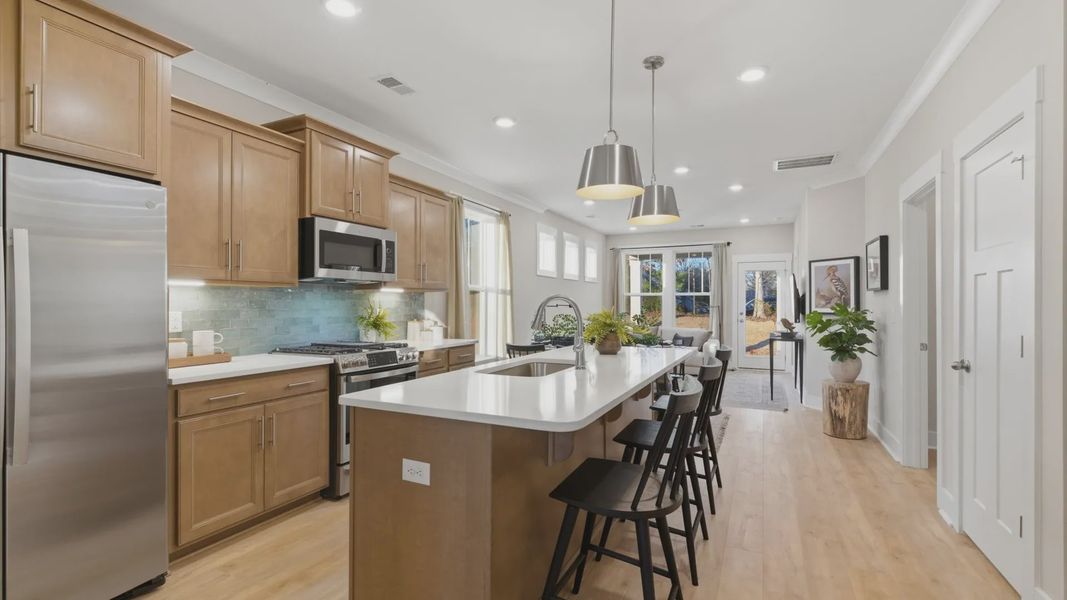 Accomplished layout with a stunning 9-foot island, pendant lighting, and superior craftsmanship in Greenville, SC