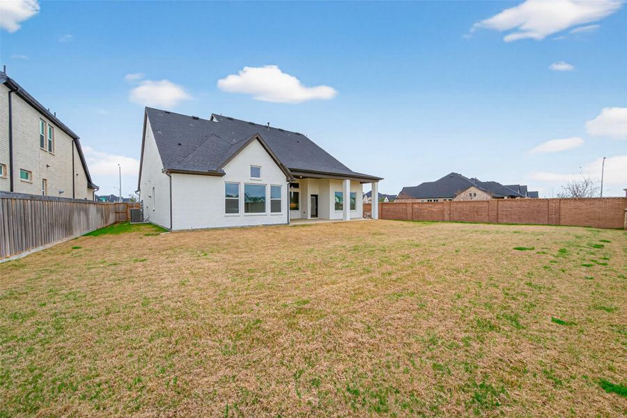 Exterior details and patio area of a home in Dunham Pointe 65' Homesites, Cypress (Image 4). Exterior details and patio area of a home in Dunham Pointe 65' Homesites, Cypress (Image 4).
