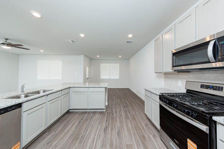 Furnished interior view inside a new home in River's Edge, Conroe (Image 6).
