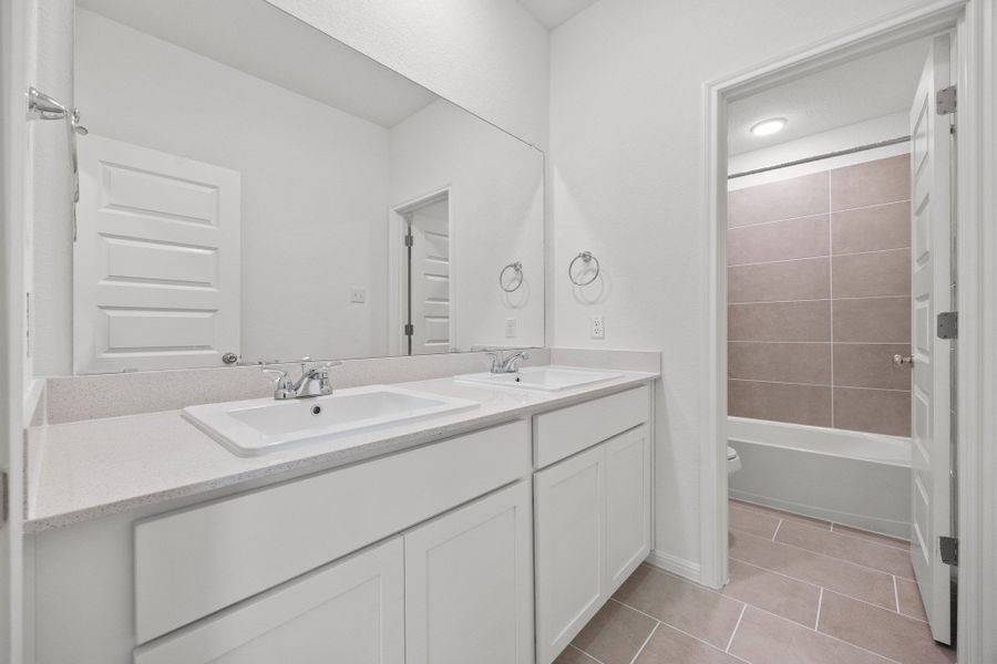 Furnished interior view inside a new home in Trinity Ranch, Elgin (Image 14).