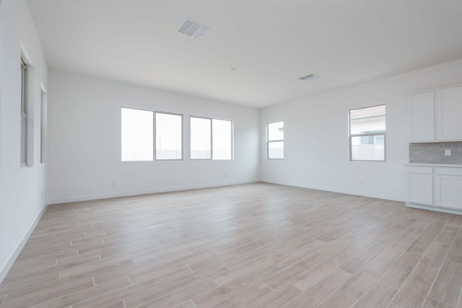 Spacious, unfurnished interior of a new home in Soleo, Queen Creek (Image 17).