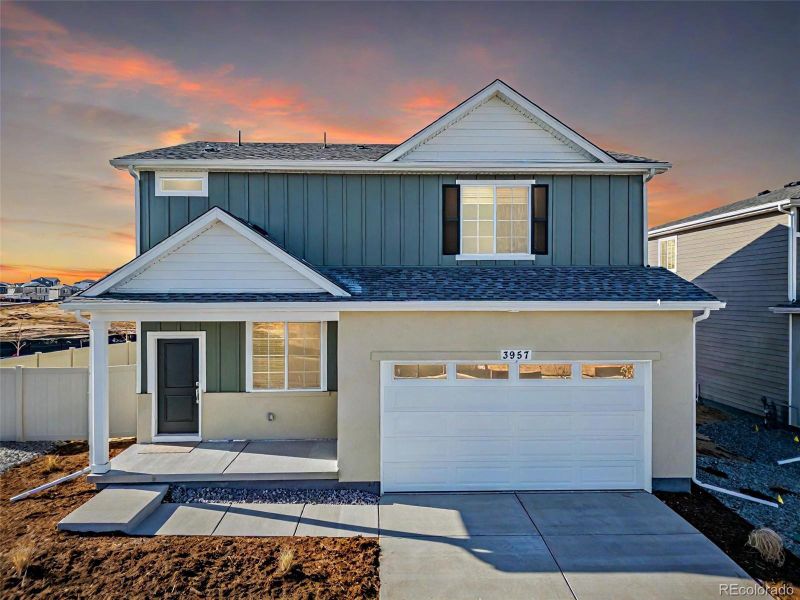 Front exterior of a new home in , Aurora, CO, highlighting curb appeal (Image 2).