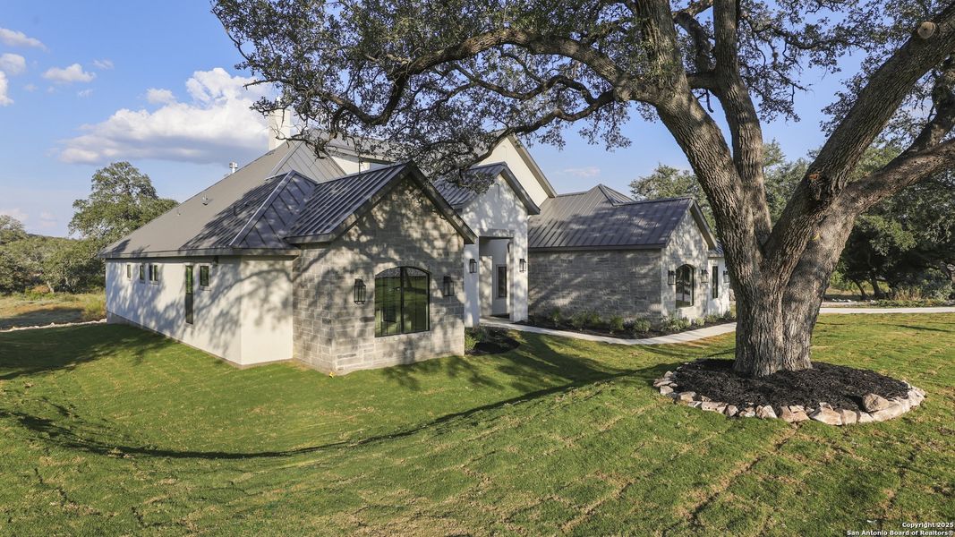 Front exterior of a new home in , New Braunfels, TX, highlighting curb appeal (Image 31).