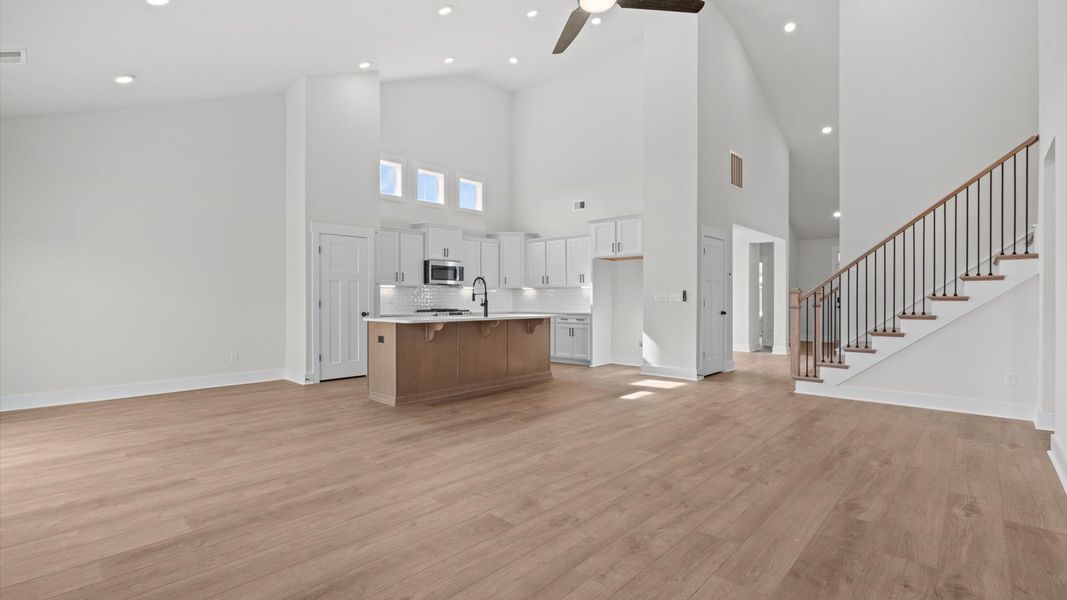 Exclusive living space with towering ceilings, tasteful finishes, and a warm, welcoming feel