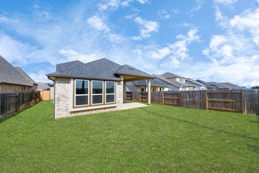 Exterior details and patio area of a home in Amira: Premier Collection, Tomball (Image 16).