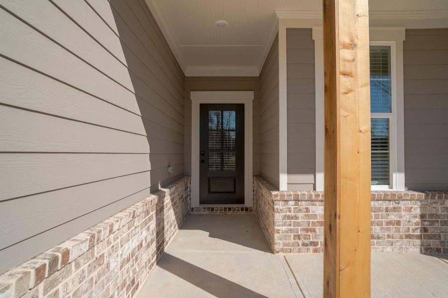 Exterior details and patio area of a home in Magnolia Ridge, Monroe (Image 3).