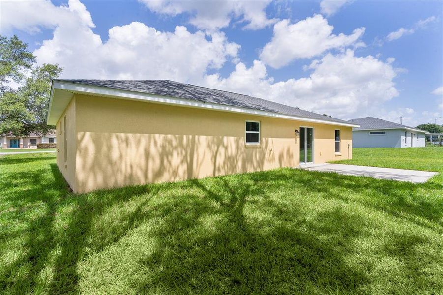 Exterior details and patio area of a home in , Summerfield (Image 20).