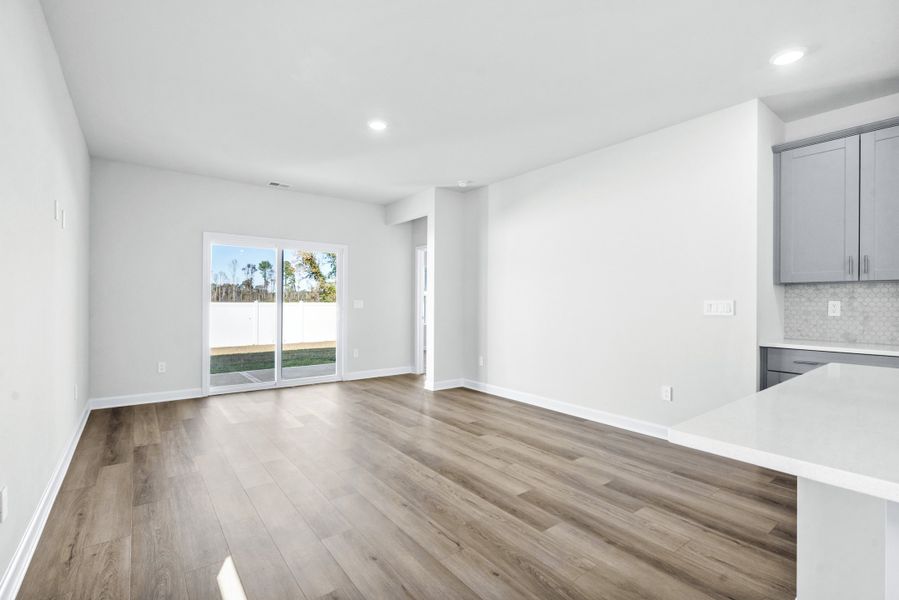 Spacious, unfurnished interior of a new home in Cypress Ridge - The Boardwalk Series, Longs (Image 12).