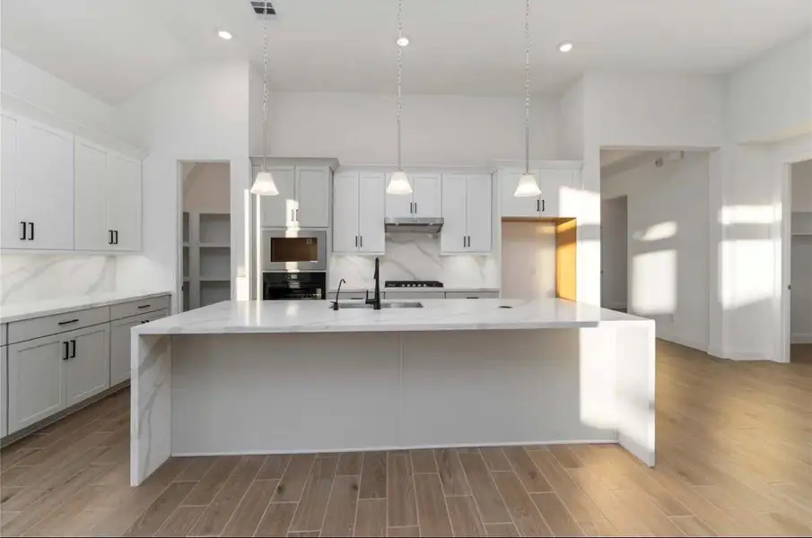 Furnished interior view inside a new home in Arabella on the Prairie, Booth (Image 5).