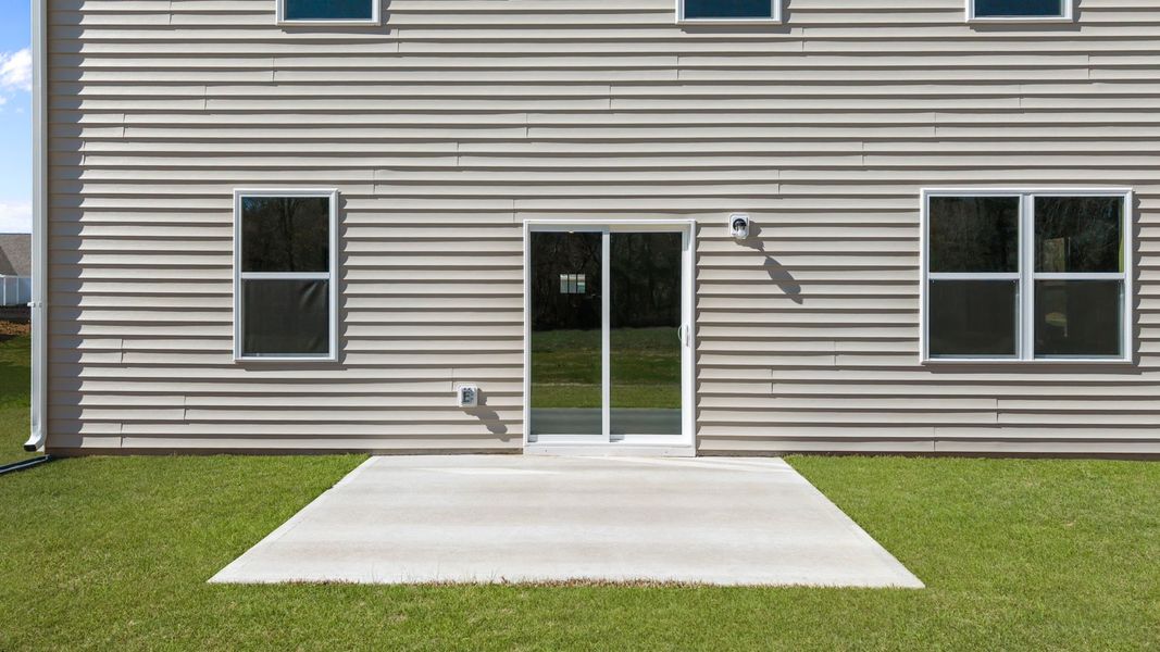 Exterior details and patio area of a home in Villa Grande, Winterville (Image 18).