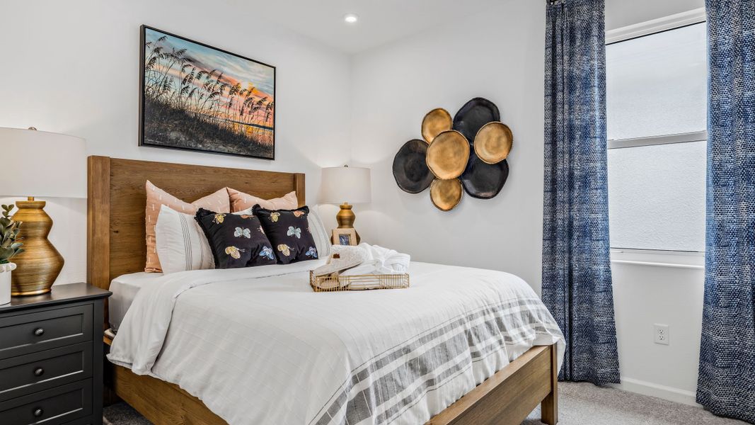 Secondary Bedroom - Model shown is from sister community