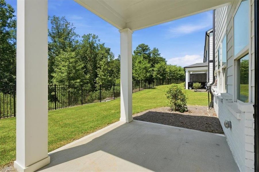 Exterior details and patio area of a home in Brooks at Riverview Landing, Smyrna (Image 25).