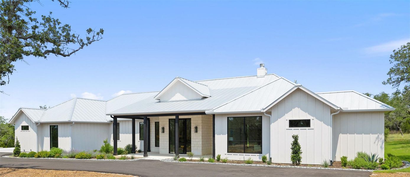 Front exterior of a new home in , Johnson City, TX, highlighting curb appeal (Image 1). Front exterior of a new home in , Johnson City, TX, highlighting curb appeal (Image 1).