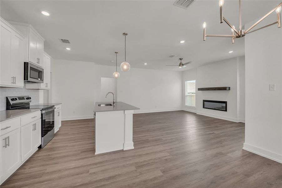 Please Note: These interior photos are not of the actual home but are of a completed one with a similar floor plan. Finishes, features, and layouts may vary.