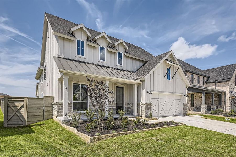 Modern farmhouse style home with board and batten siding, a standing seam roof, driveway, and roof with shingles Modern farmhouse style home with board and batten siding, a standing seam roof, driveway, and roof with shingles