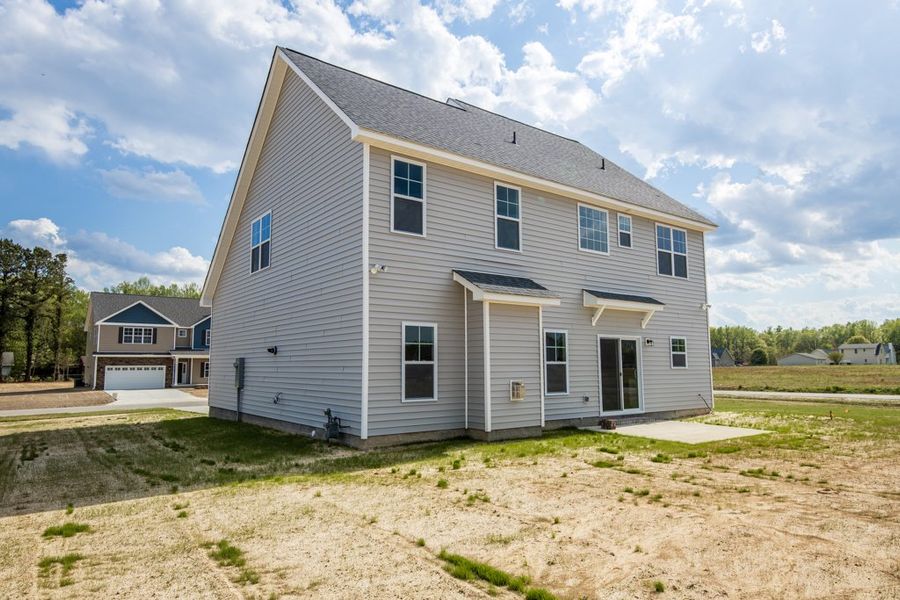 Representative exterior photo of a completed home built from the Ryder by Bill Clark Homes in Arbor Hills South II, Greenville, NC (Image 29). Representative exterior photo of a completed home built from the Ryder by Bill Clark Homes in Arbor Hills South II, Greenville, NC (Image 29).