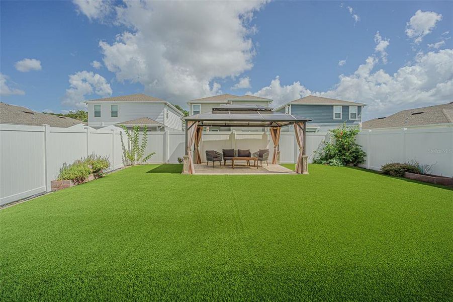 Exterior details and patio area of a home in , Spring Hill (Image 2). Exterior details and patio area of a home in , Spring Hill (Image 2).