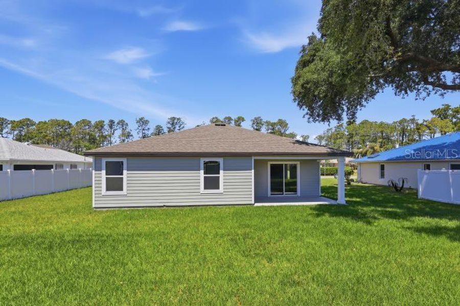 Exterior details and patio area of a home in Palm Coast, Palm Coast (Image 21).