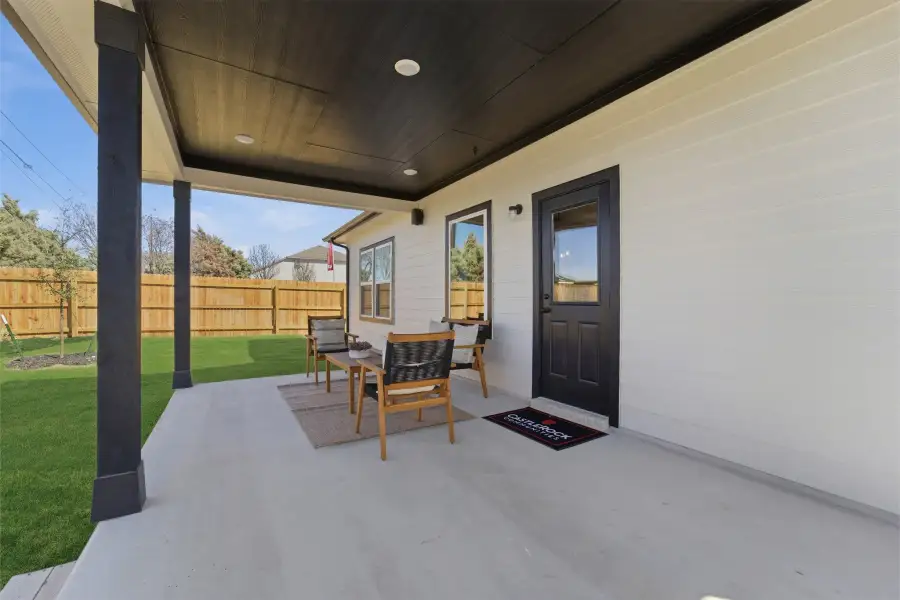 Exterior details and patio area of a home in Heartland, Crandall (Image 2).