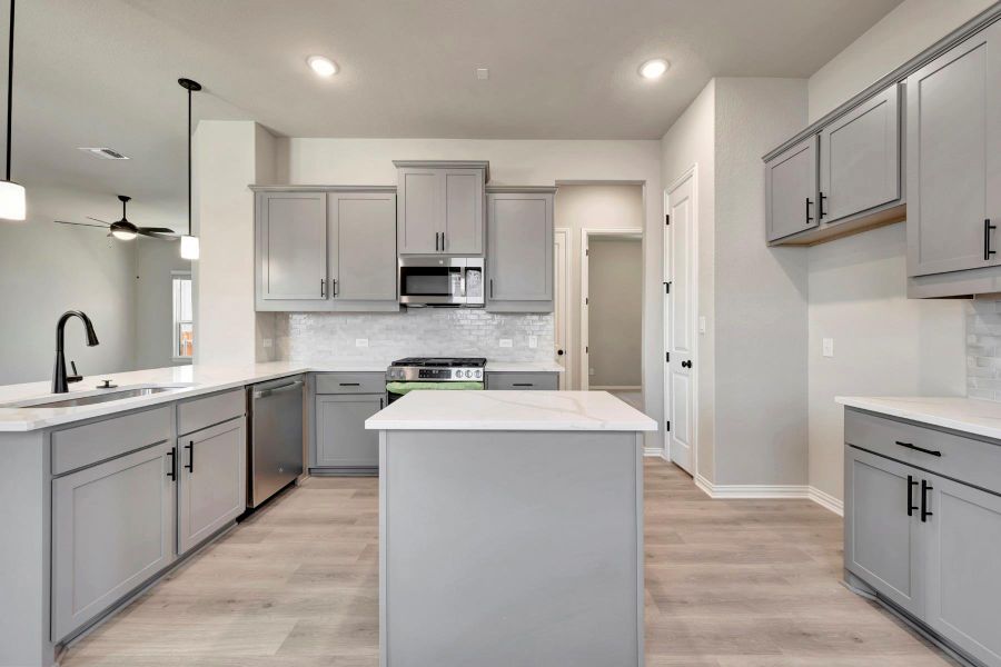Furnished interior view inside a new home in Heritage, Dripping Springs (Image 6).