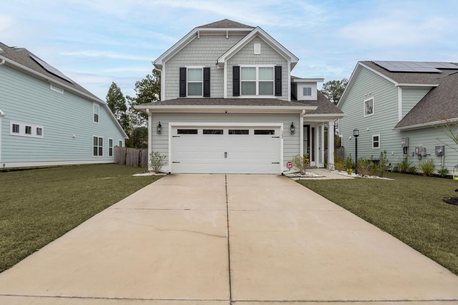 Front exterior of a new home in Abbey Walk, Moncks Corner, SC, highlighting curb appeal (Image 22). Front exterior of a new home in Abbey Walk, Moncks Corner, SC, highlighting curb appeal (Image 22).