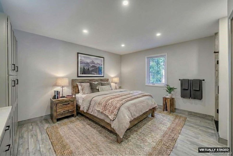 Main Level Guest Ensuite bedroom 1 virtually staged