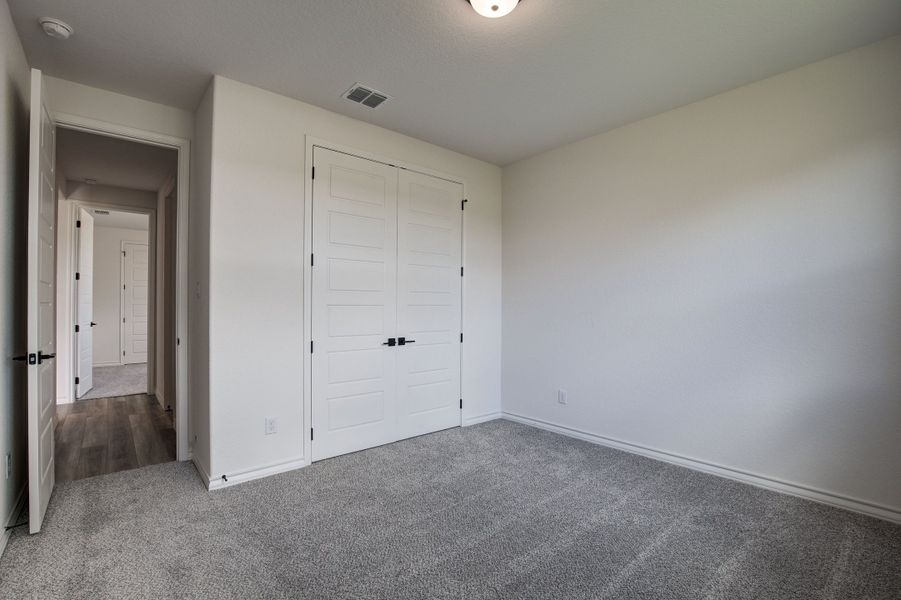 Representative unfurnished interior of a home built from the The Lanier F by Davidson Homes LLC in The Reserve at Potranco Oaks, Castroville (Image 28).