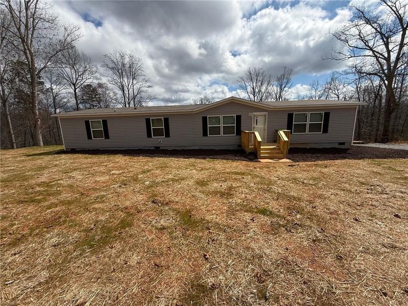 Exterior details and patio area of a home in , Ellijay (Image 12). Exterior details and patio area of a home in , Ellijay (Image 12).