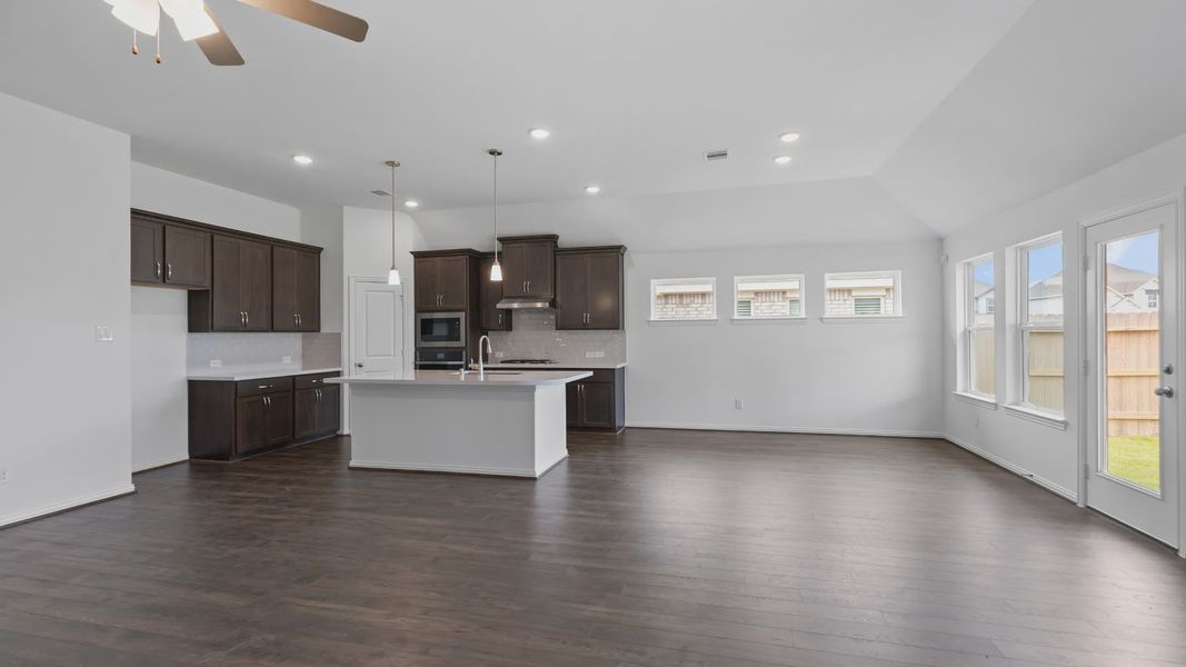 Furnished interior view inside a new home in Sunterra, Katy (Image 11).