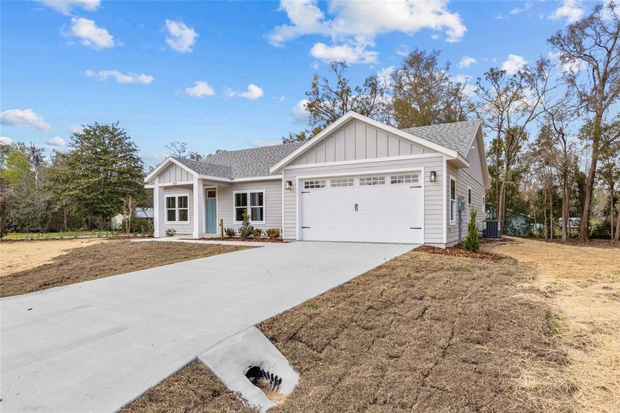 Front exterior of a new home in , Bronson, FL, highlighting curb appeal (Image 21).