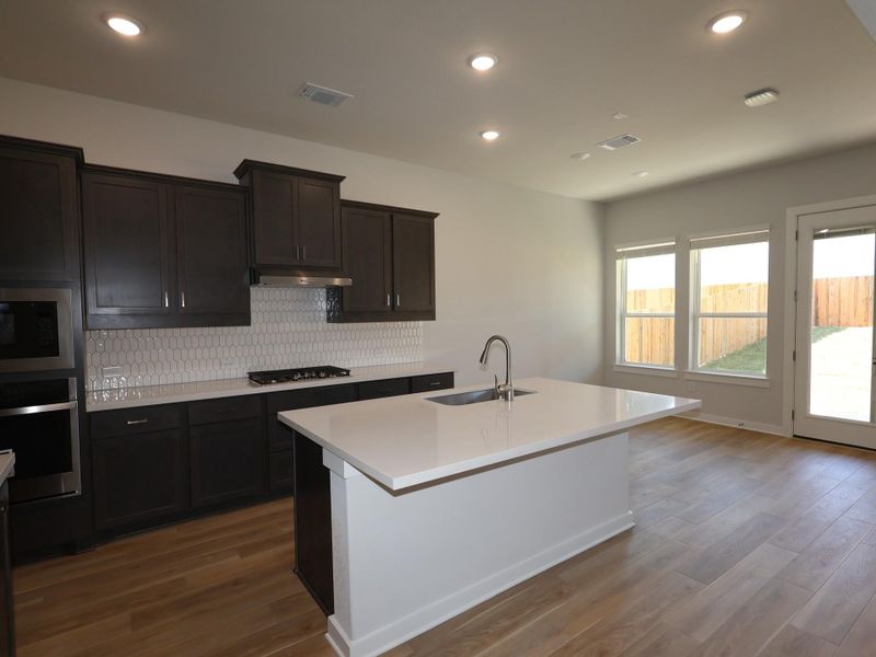 Furnished interior view inside a new home in Edgewood, Leander (Image 8). Furnished interior view inside a new home in Edgewood, Leander (Image 8).