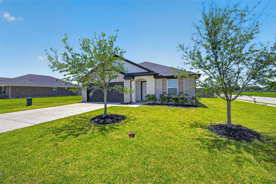 Front exterior of a new home in , Texas City, TX, highlighting curb appeal (Image 27).