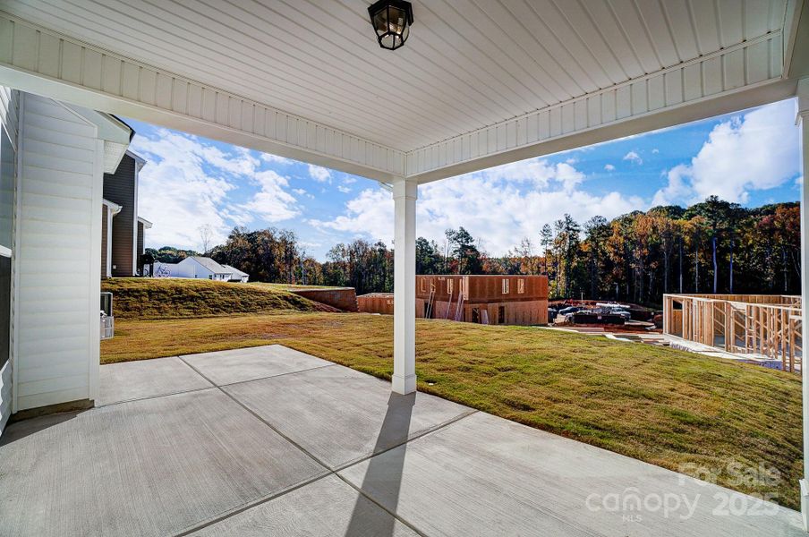 This home does not have a rear covered porch - sunroom instead.