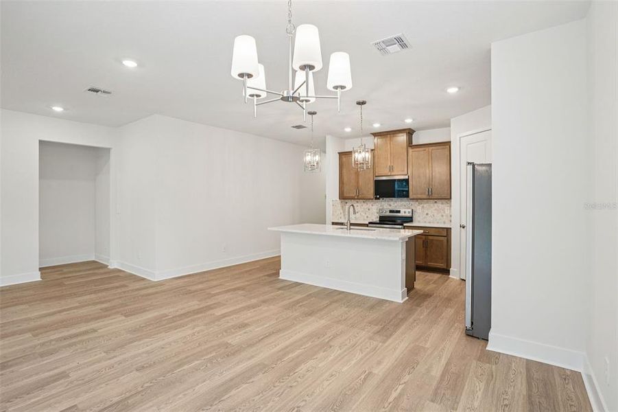 Furnished interior view inside a new home in Ridgehaven - Signature Series, Ormond Beach (Image 7).